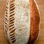 sourdough bread loaf with perfect scoring