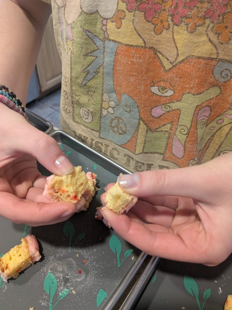 My 13-year-old daughter is breaking apart her freeze-dried birthday cake.