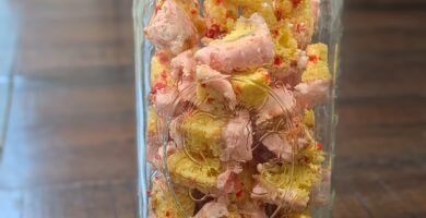 A half-gallon mason jar full of freeze-dried birthday cake bites.