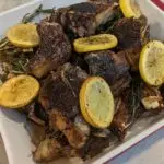 Pan seared paleo friendly lamb chop dinner recipe with garlic, rosemary, and lemon