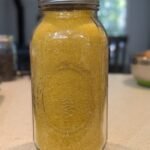 A half gallon mason jar full of powdered freeze dried eggs