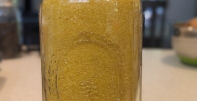 A half gallon mason jar full of powdered freeze dried eggs
