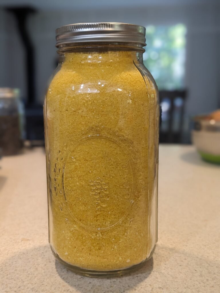 A half gallon mason jar full of powdered freeze dried eggs