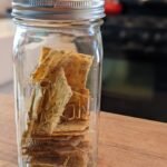 Sourdough discard crackers stored in an airtight mason jar