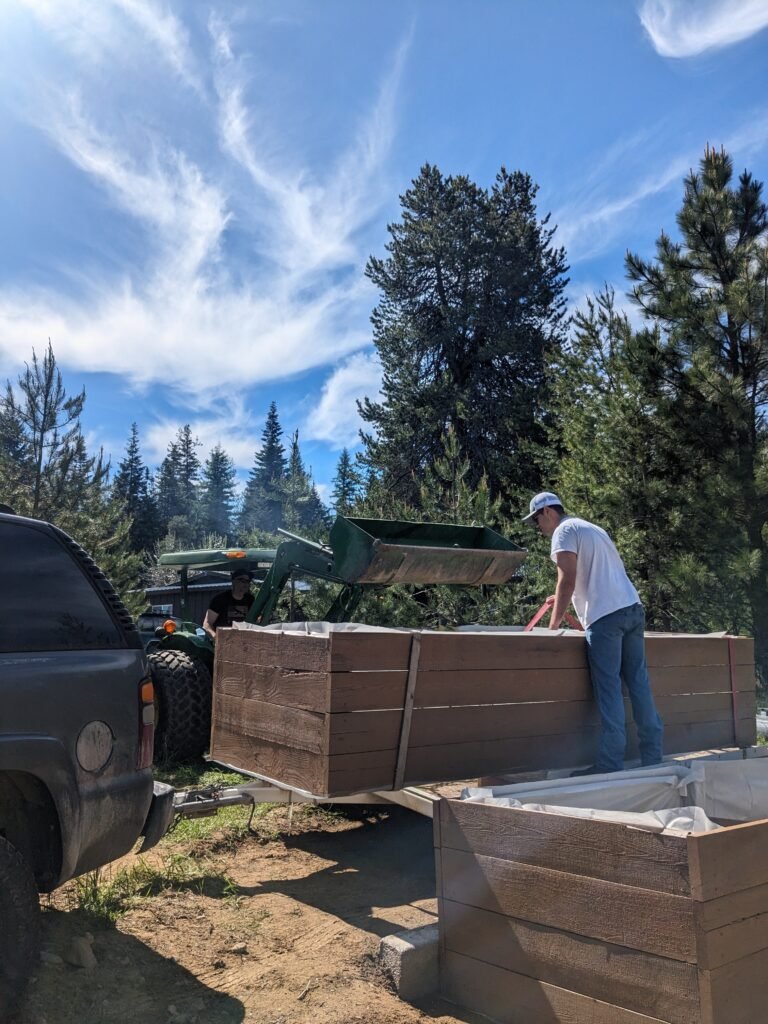 Installing homemade raised gardene beds
