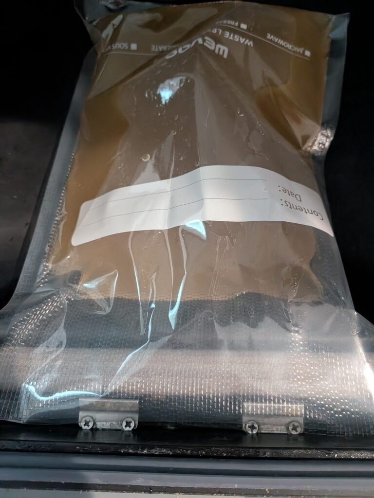 Wevac chamber vacuum with homemade chicken bone broth in vacuum sealed bag