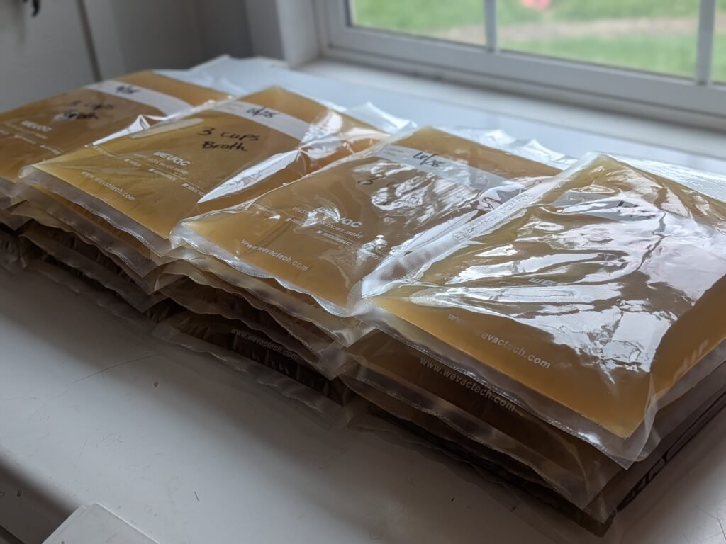 Homemade chicken bone broth in freezer bags