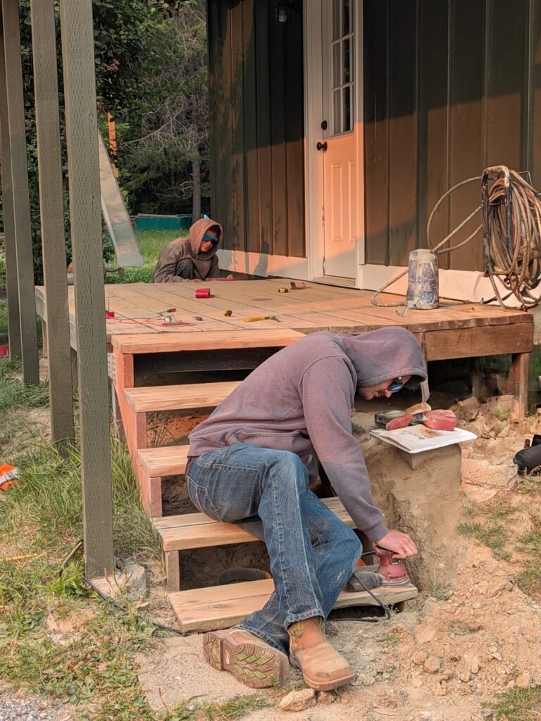 sanding a wooden porch