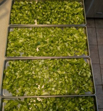 trays of chopped bell peppers