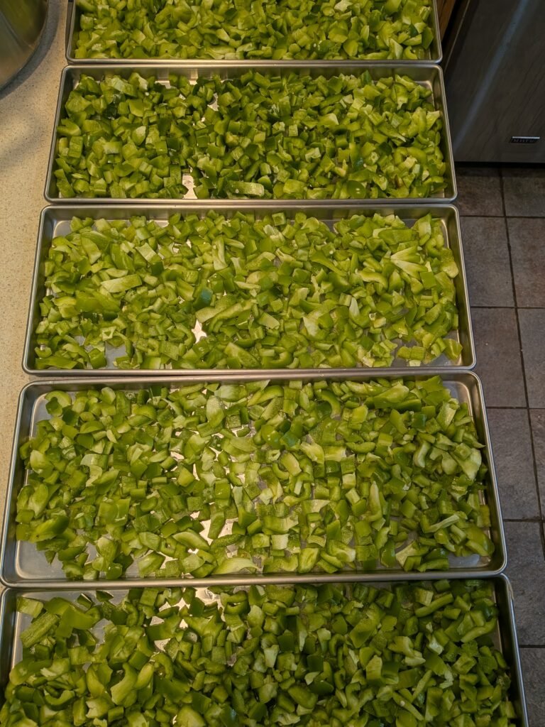 trays of chopped bell peppers