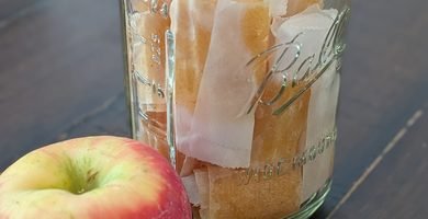 mason jar full of homemade applesauce fruit leathers